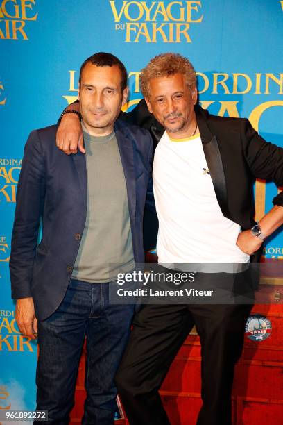Actors Zinedine Soualem and Abel Jafri attend "L'Extraordinaire Voyage du Fakir" Paris Premiere at Publicis Champs Elysees on May 23, 2018 in Paris,...
