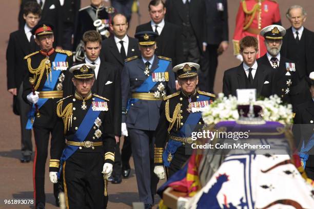 The coffin carrying the Queen Mother departs from St. James Palace, followed by members of the Royal Family.