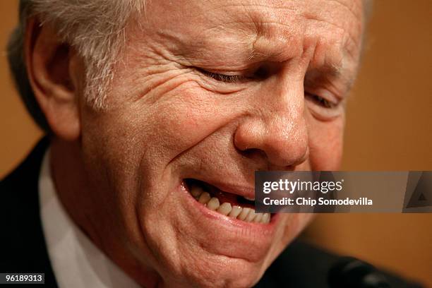 Senate Homeland Security and Governmental Affairs Committee Chairman Joe Lieberman winces while giving an opening statement during a hearing about...