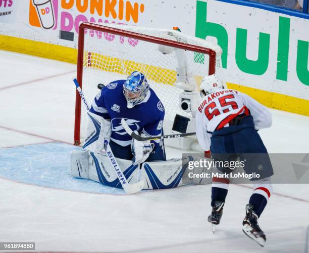 Goalie Andrei Vasilevskiy of the Tampa Bay Lightning gives up a goal Andre Burakovsky of the Washington Capitals during Game Seven of the Eastern...