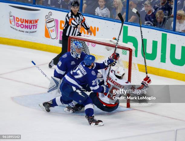 Goalie Andrei Vasilevskiy of the Tampa Bay Lightning gives up a goal to Andre Burakovsky of the Washington Capitals during Game Seven of the Eastern...