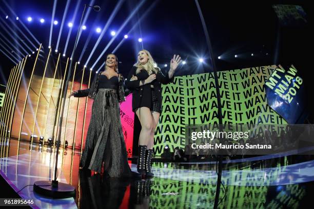 Cleo Pires and Niina Secrets speaks on stage during the MTV MIAW 2018 at Citibank Hall on May 23, 2018 in Sao Paulo, Brazil.