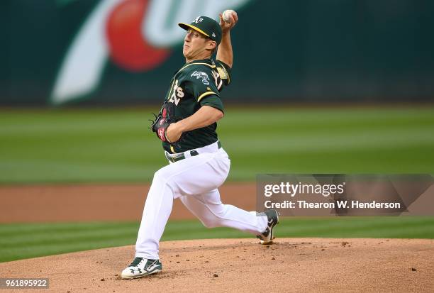 Daniel Gossett of the Oakland Athletics pitches against the Seattle Mariners in the top of the first inning at the Oakland Alameda Coliseum on May...