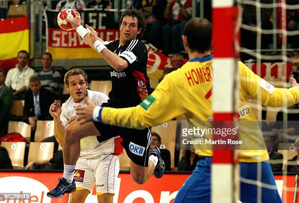 Torsten Jansen of Germany throws at the goal during the Men's Handball European main round Group II match between Germany and Spain at the Olympia...