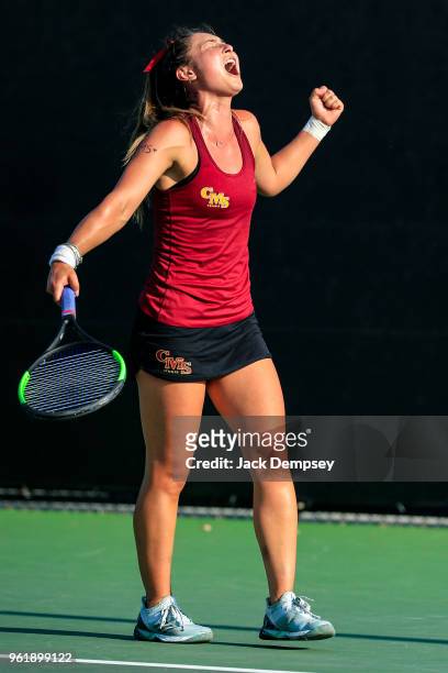 Catherine Allen of the Claremont-Mudd-Scripps Athenas reacts to winning a point against Bridget Harding of the Emory Eagles during the Division III...