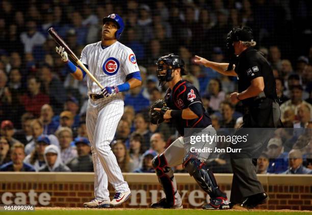 Addison Russell of the Chicago Cubs reacts after striking out against the Cleveland Indians during the seventh inning at Wrigley Field on May 23,...