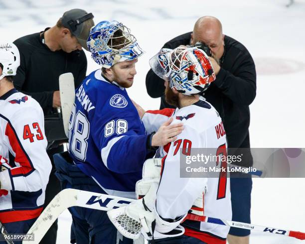 Goalie Andrei Vasilevskiy of the Tampa Bay Lightning and Braden Holtby of the Washington Capitals shake hands after Game Seven of the Eastern...