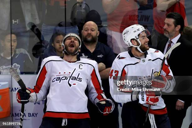 Alex Ovechkin and Tom Wilson of the Washington Capitals celebrate after defeating the Tampa Bay Lightning in Game Seven of the Eastern Conference...