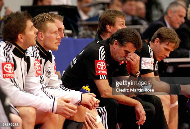 Heiner Brand , head coach of Germany looks dejected during the Men's Handball European main round Group II match between Germany and Spain at the...