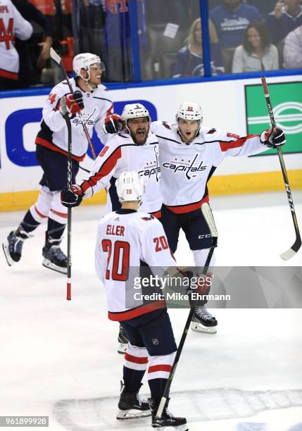 Alex Ovechkin, Andre Burakovsky, Lars Eller and John Carlson the Washington Capitals celebrate after defeating the Tampa Bay Lightning in Game Seven...