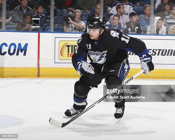 Jeff Halpern of the Tampa Bay Lightning races to the puck against the Toronto Maple Leafs at the St. Pete Times Forum on January 21, 2010 in Tampa,...