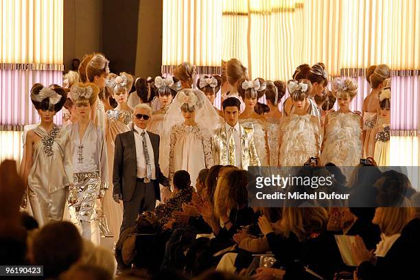 Karl Lagerfeld and models walk the runway Chanel Fashion Show during Paris Fashion Week Haute Couture S/S 2010 on January 26, 2010 in Paris, France.