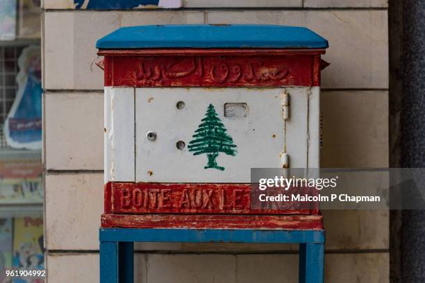 lebanese mailbox with national flag, byblos, lebanon - byblos stockfoto's en -beelden