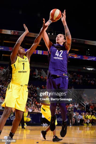 Brittney Griner of the Phoenix Mercury shoots the ball against Crystal Langhorne of the Seattle Storm on May 23, 2018 at Talking Stick Resort Arena...