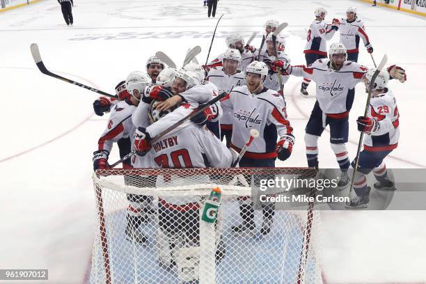 The Washington Capitals celebrate after defeating the Tampa Bay Lightning in Game Seven of the Eastern Conference Finals during the 2018 NHL Stanley...