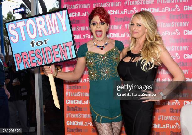 Pop artist Sham Ibrahim and Stormy Daniels attend her fan meet and greet at Chi Chi LaRue's on May 23, 2018 in West Hollywood, California.