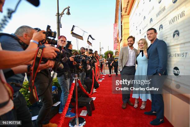Actors Daniel Bruhl, Dakota Fanning, and Luke Evans attend The Alienist - Los Angeles For Your Consideration Event at Wallis Annenberg Center for the...