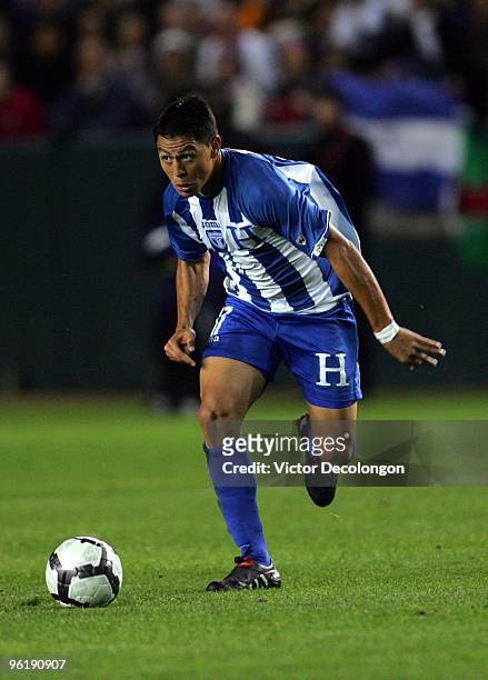 Roger Espinoza of Honduras paces the ball on the attack during their international friendly match against USA on January 23, 2010 in Carson,...