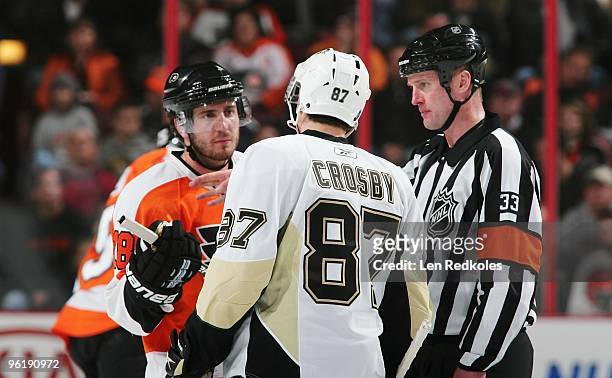 Referee Kevin Pollock separates Mike Richards of the Philadelphia Flyers and Sidney Crosby of the Pittsburgh Penguins on January 24, 2010 at the...