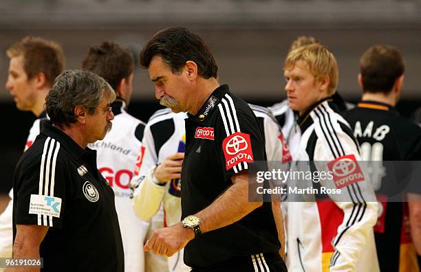 Heiner Brand, head coach of Germany looks dejected during the Men's Handball European main round Group II match between Germany and Spain at the...