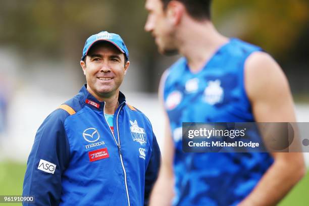 Kangaroos head coach Brad Scott reacts to Jarrad Waite of the Kangaroos during the North Melbourne Kangaroos AFL training session at Arden Street...