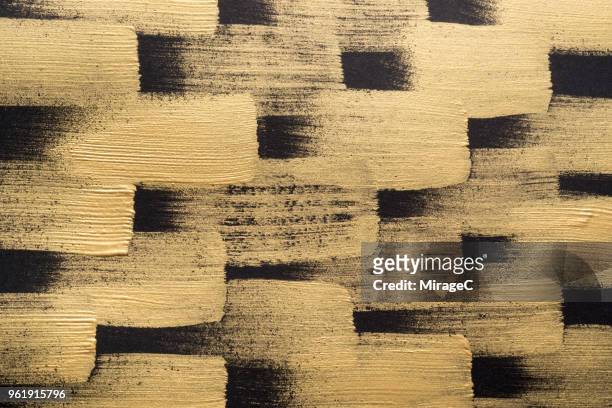 gold colored brush strokes pattern - brushed gold stock pictures, royalty-free photos & images