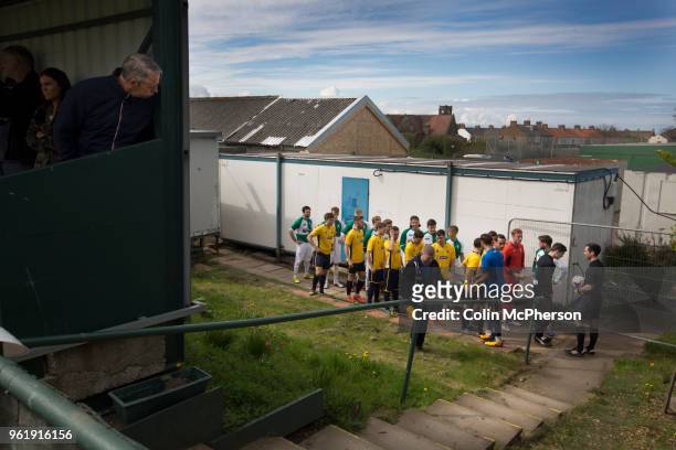 The two teams waiting outside the dressing rooms at Mount Pleasant before Marske United take on Billingham Synthonia in a Northern League division...