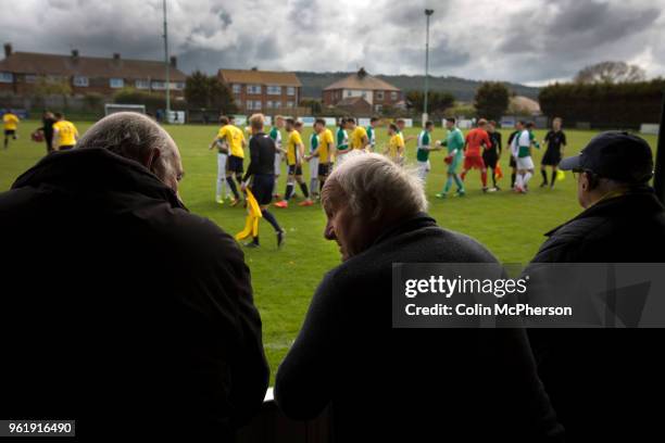 The two teams exchanging handshakes on the pitch at Mount Pleasant before Marske United take on Billingham Synthonia in a Northern League division...