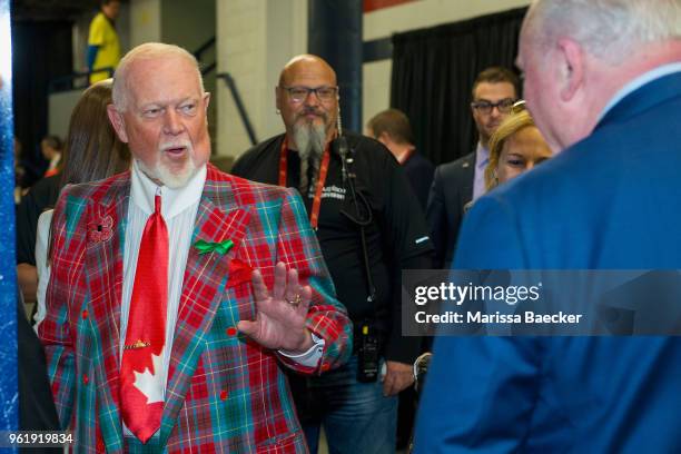 Television personality, Don Cherry of Coaches Corner speaks to team staff outside the dressing room at Brandt Centre - Evraz Place on May 21, 2018 in...