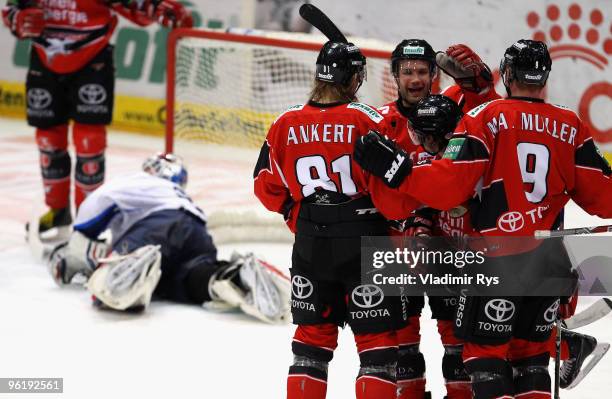 Kevin Hecquefeuille of Haie is celebrated after scoring his team's fifth goal during the DEL game between Koelner Haie and Adler Mannheim at Lanxess...