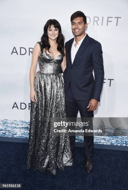 Actress Shailene Woodley and rugby player Ben Volavola arrive at the premiere of STX Films' "Adrift" at the Regal LA Live Stadium 14 on May 23, 2018...