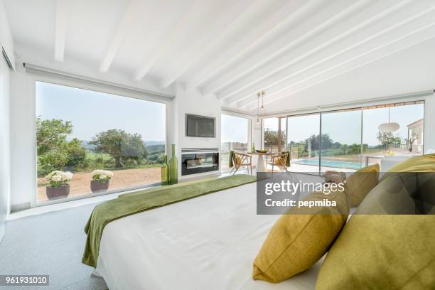 double bed in luxury hotel - pepmiba stock pictures, royalty-free photos & images