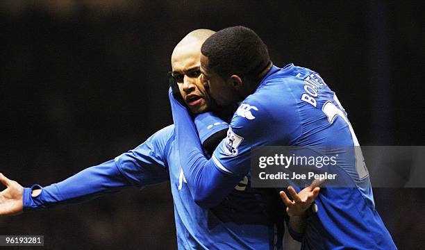 Danny Webber of Portsmouth celebrates with Kevin-Prince Boateng after scoring Portsmouth's first goal during the Barclays Premier League match...