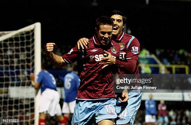 Matthew Upson of West Ham celebrates scoring the first goal during the Barclays Premier League match between Portsmouth and West Ham United at...