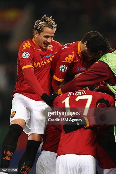 Philippe Mexes with his teammates of AS Roma celebrate the opening goal during the Tim Cup between Roma and Catania at Olimpico Stadium on January...