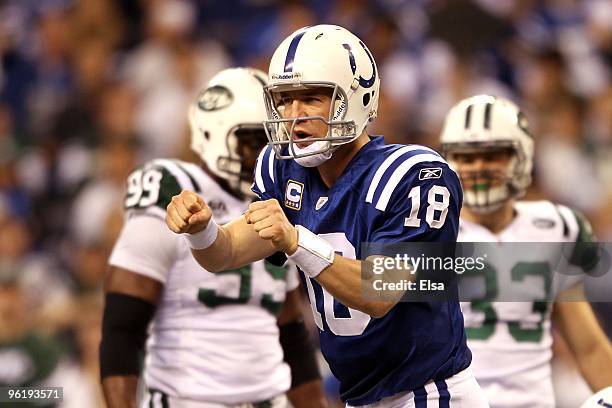 Quarterback Peyton Manning of the Indianapolis Colts reacts during the first half against the New York Jets during the AFC Championship Game at Lucas...