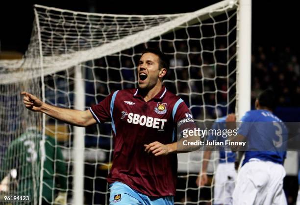Matthew Upson of West Ham celebrates scoring the first goal during the Barclays Premier League match between Portsmouth and West Ham United at...
