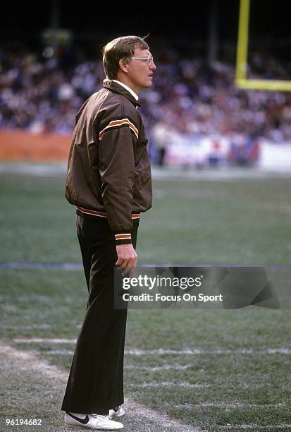 S: Head Coach Marty Schottenheimer of the Cleveland Browns watching the action from the sidelines during a mid circa 1980's NFL football game at...