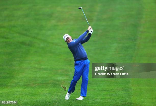 Jamie Donaldson of Wales plays his second shot on the 4th hole during day one of the BMW PGA Championship at Wentworth on May 24, 2018 in Virginia...
