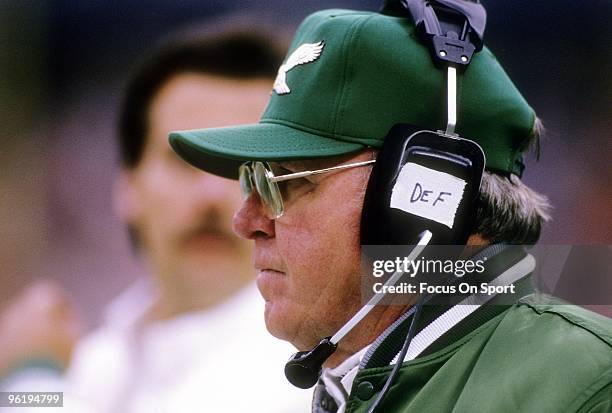 Head Coach Buddy Ryan of the Philadelphia Eagles watches the action from the sideline during a late circa 1980;s NFL football game. Ryan was the head...