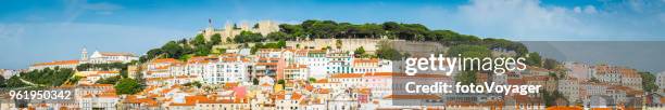 lisbon panoramic cityscape view across rooftops of baixa graca portugal - graca church stock pictures, royalty-free photos & images
