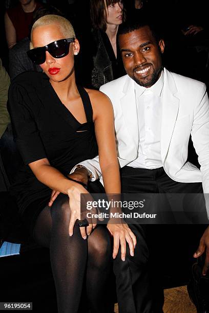 Amber Rose and Kanye West attend Givenchy Fashion Show during Paris Fashion Week Haute Couture S/S 2010 on January 26, 2010 in Paris, France.