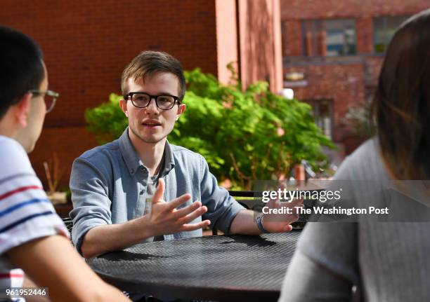 George Washington University junior Theodore Leavell, outgoing Vice President of Community Affairs for the Student Association, left; sophomore James...