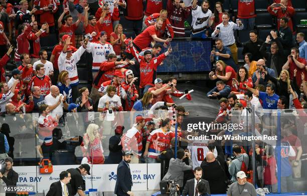 Washington Capitals left wing Alex Ovechkin walks into the locker room after defeating the Tampa Bay Lightning 4-0 during game seven of the eastern...