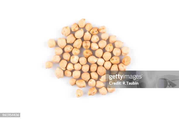 heap of chick-pea. beans isolated on a white background. close-up. - chick pea stock pictures, royalty-free photos & images