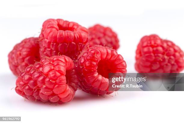 fresh raspberry isolated on a white background - framboos stockfoto's en -beelden