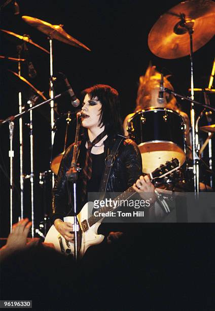 Singer-guitarist Joan Jett and drummer Sandy West of The Runaways With Joan Jett perform at Atlanta Municipal Auditorium on February 25, 1978 in...
