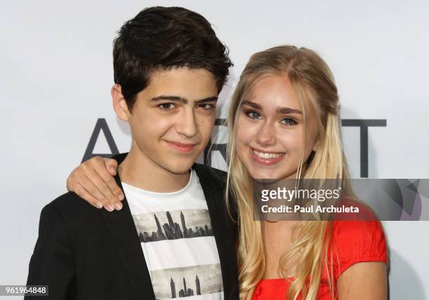 Actors Joshua Rush and Emily Skinner attend the premiere of STX Films' "Adrift" at Regal LA Live Stadium 14 on May 23, 2018 in Los Angeles,...