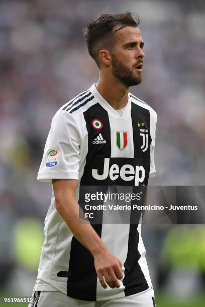 Miralem Pjanic of Juventus looks on during the Serie A match between Juventus and Hellas Verona FC at Allianz Stadium on May 19, 2018 in Turin, Italy.