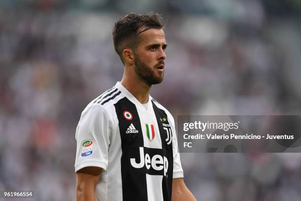 Miralem Pjanic of Juventus looks on during the Serie A match between Juventus and Hellas Verona FC at Allianz Stadium on May 19, 2018 in Turin, Italy.